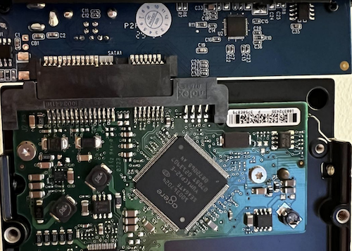 Close-up of a Seagate hard drive's circuit board and SATA connector